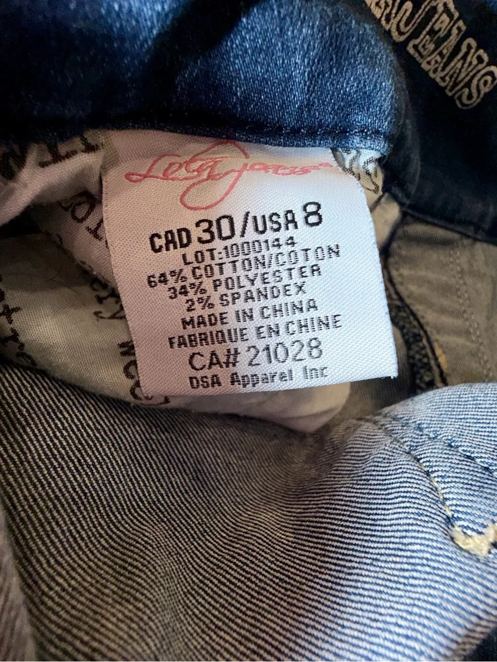 Lola Leah MLB Mid-Rise Bootcut Flared Stretch Jeans in Medium Blue Wash 8. A50